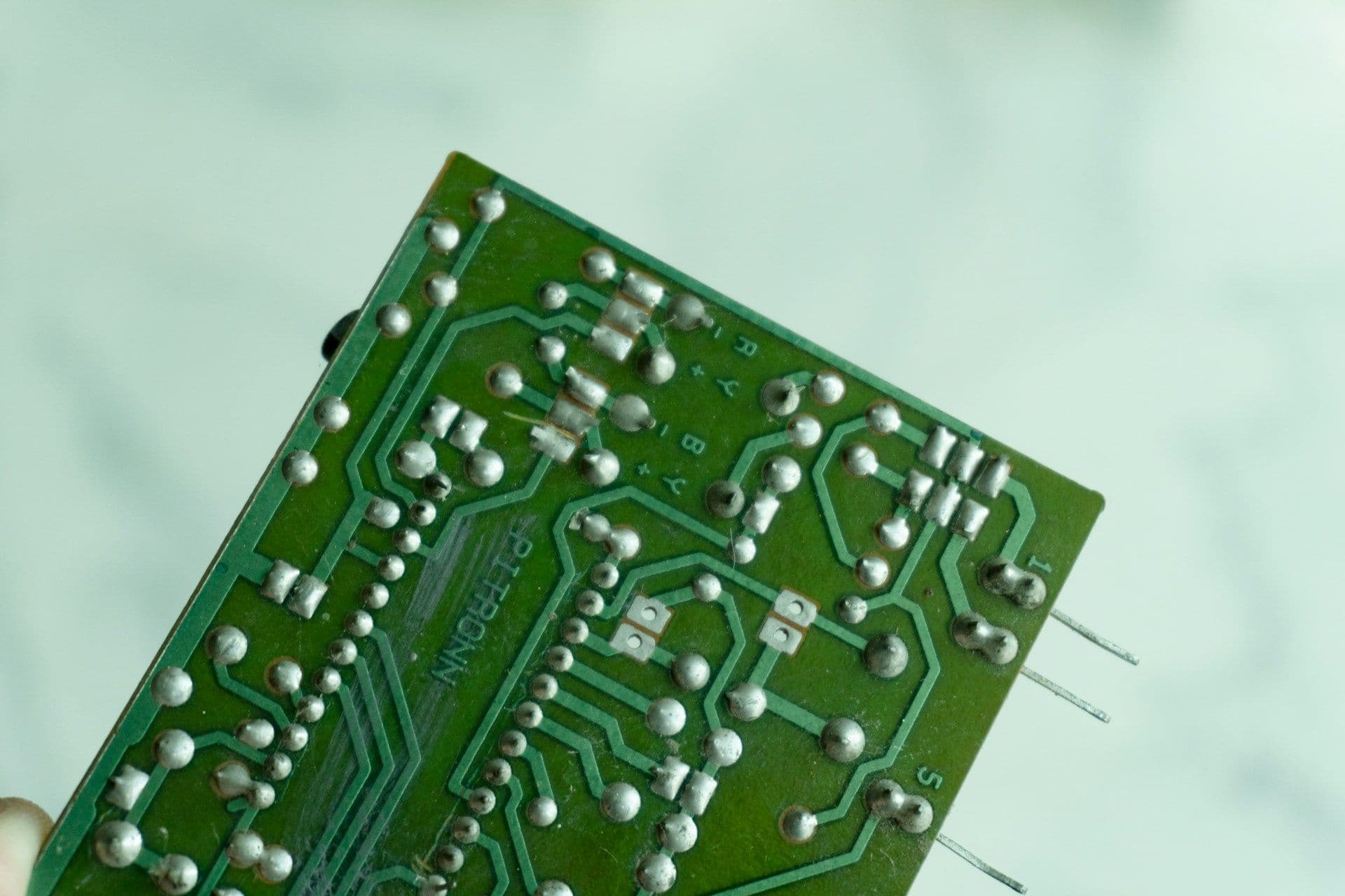 AI robotic hand on circuit board
