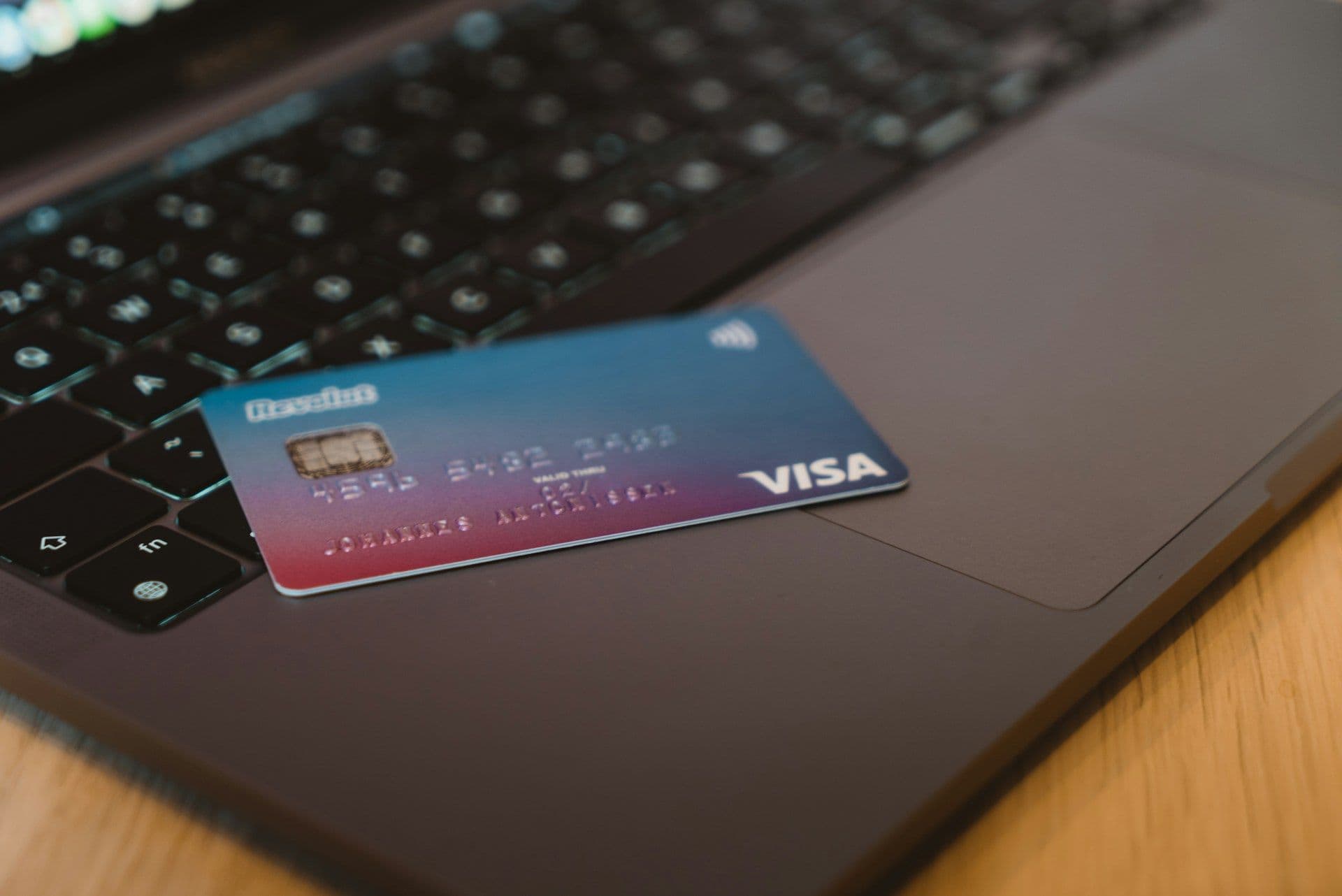 Card payment being processed on a laptop